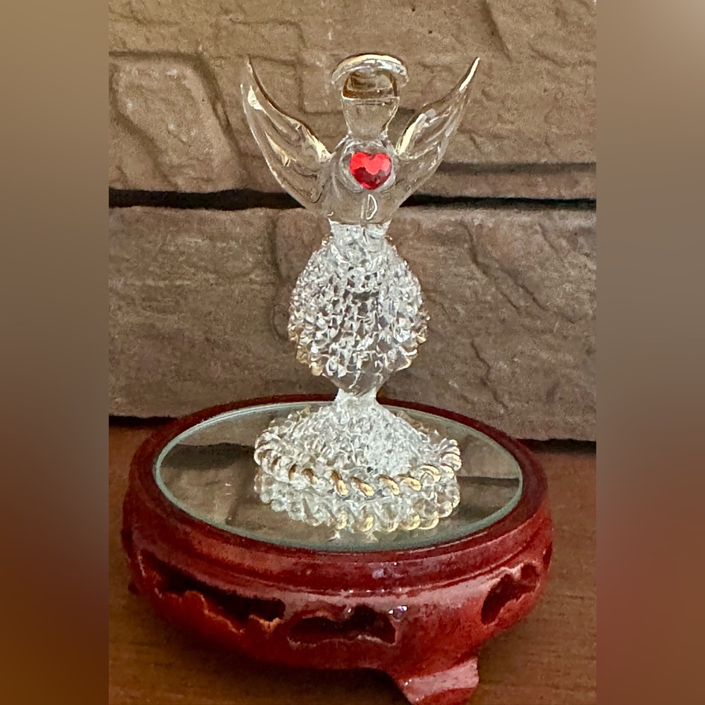 Art glass blown and spun glass angel with wooden mirrored pedestal. Vintage
